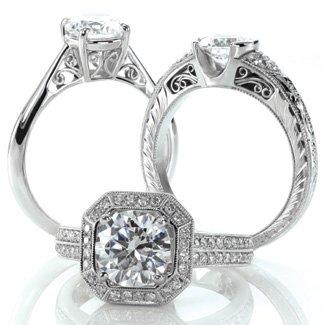 Knox Jewelers Logo - Close up of woman kissing man on cheek.  Her hand is supporting his chin, and on that hand is her engagement ring.